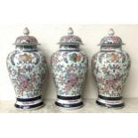 A Sampson 'Chinese Armorial' garniture of three vases, and covers, 40 cm high (3)