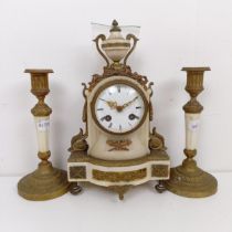 A late 19th century clock garniture, the clock having a 7 cm diameter enamel dial, with Roman