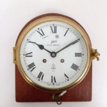 A bulkhead clock, the 12.5 cm diameter enamel dial signed Schatz Royal Mariner, with Roman numerals,