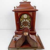 An 18th century style bracket clock, the arched brass dial signed Joshua Herring, London, with a