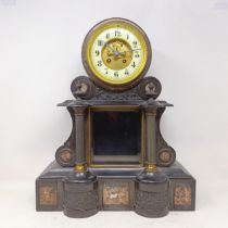 A mantel clock, with an enamel dial, and a twin train eight day movement, striking on a bell, with a