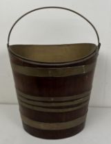 A 19th century mahogany brass bound tea bucket, 34 cm wide