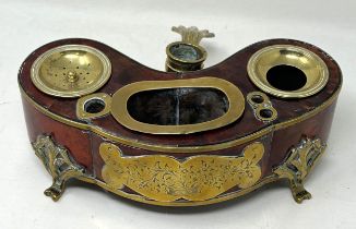 A 19th century Continental tortoiseshell and brass bound inkstand, 22 cm wide