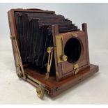 A Thornton Pickard mahogany plate camera, with assorted plates (qty)