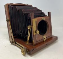 A Thornton Pickard mahogany plate camera, with assorted plates (qty)