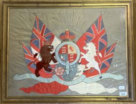 A late 19th/early 20th century silk embroidered military crest, label verso for S Yegami, 49 x 64