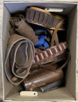 Assorted leather cartridge belts, hunting items and a case of fishing and taxidermy related items (2