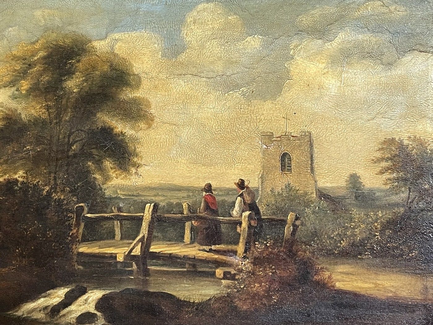 19th century, English school, figures on a bridge by a Church, oil on canvas, 35 x 44 cm