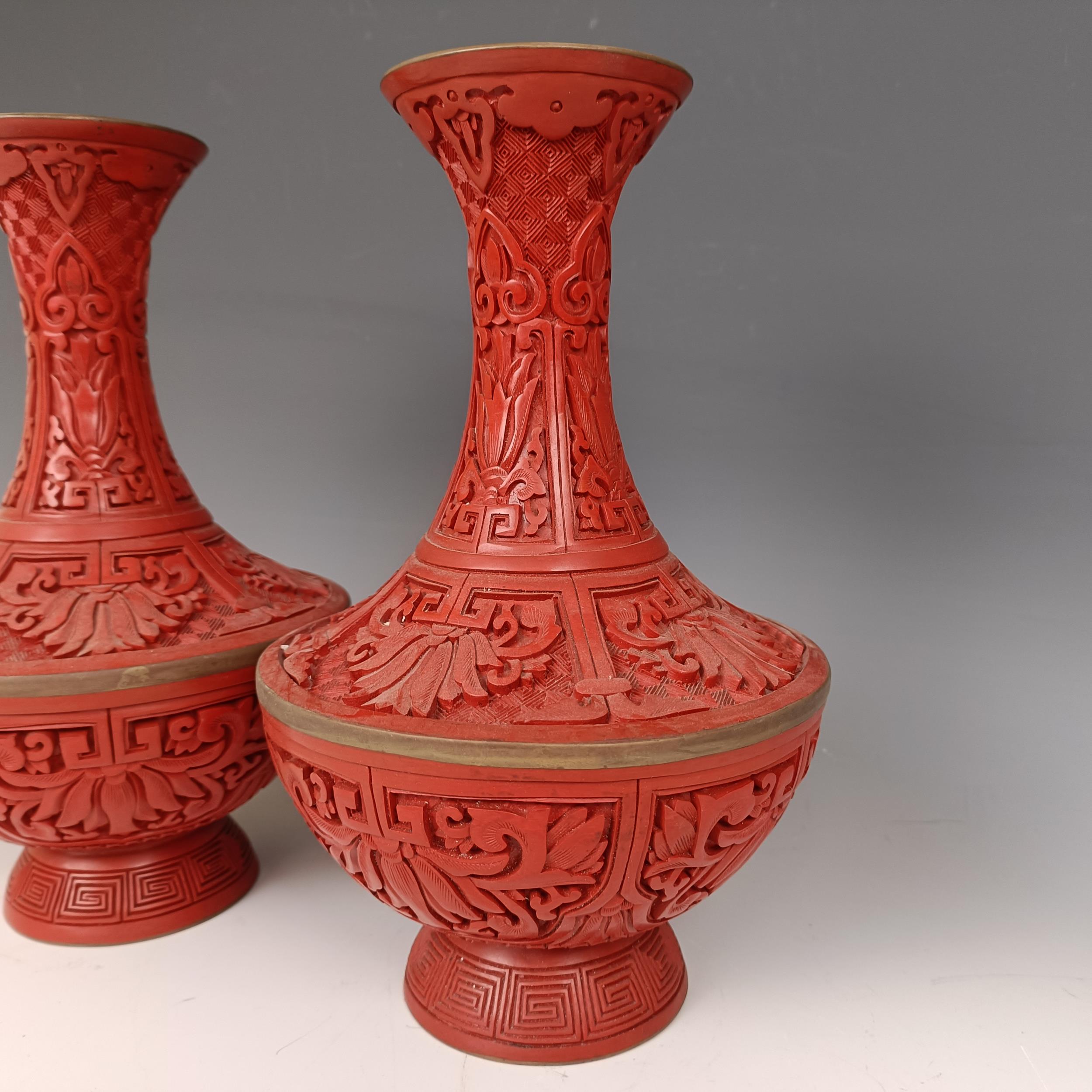 A pair of Chinese cinnabar lacquer vases, 27 cm high Provenance: Purchased from the Sotheby's - Image 2 of 9