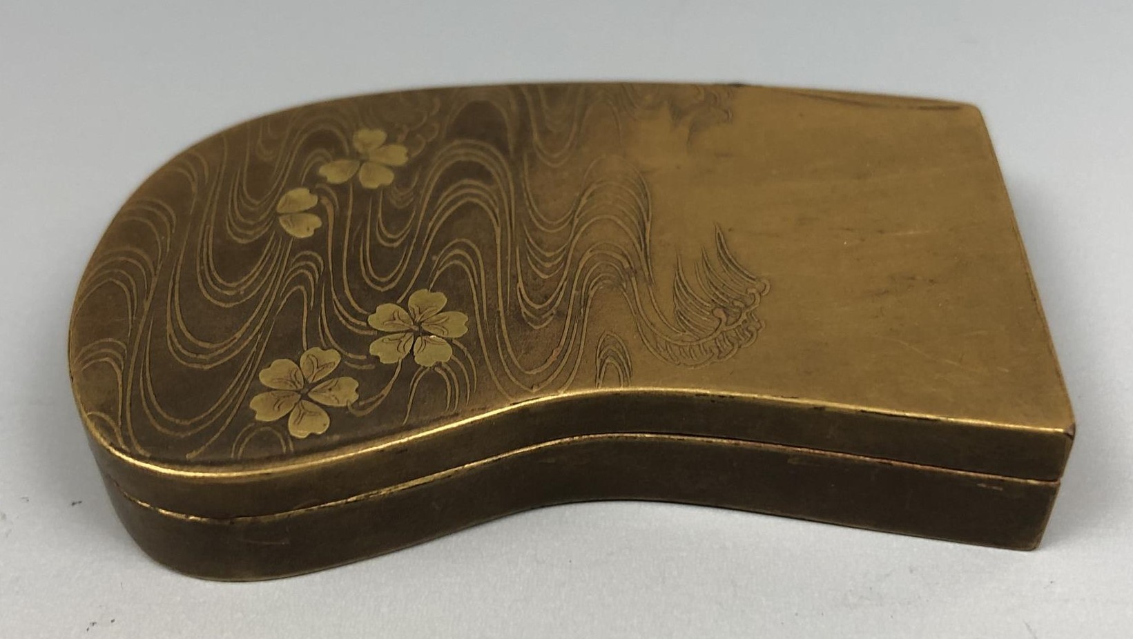 A Japanese lacquered box and cover, of shaped rectangular form, decorated flowers in a lake, 6 cm - Image 3 of 4