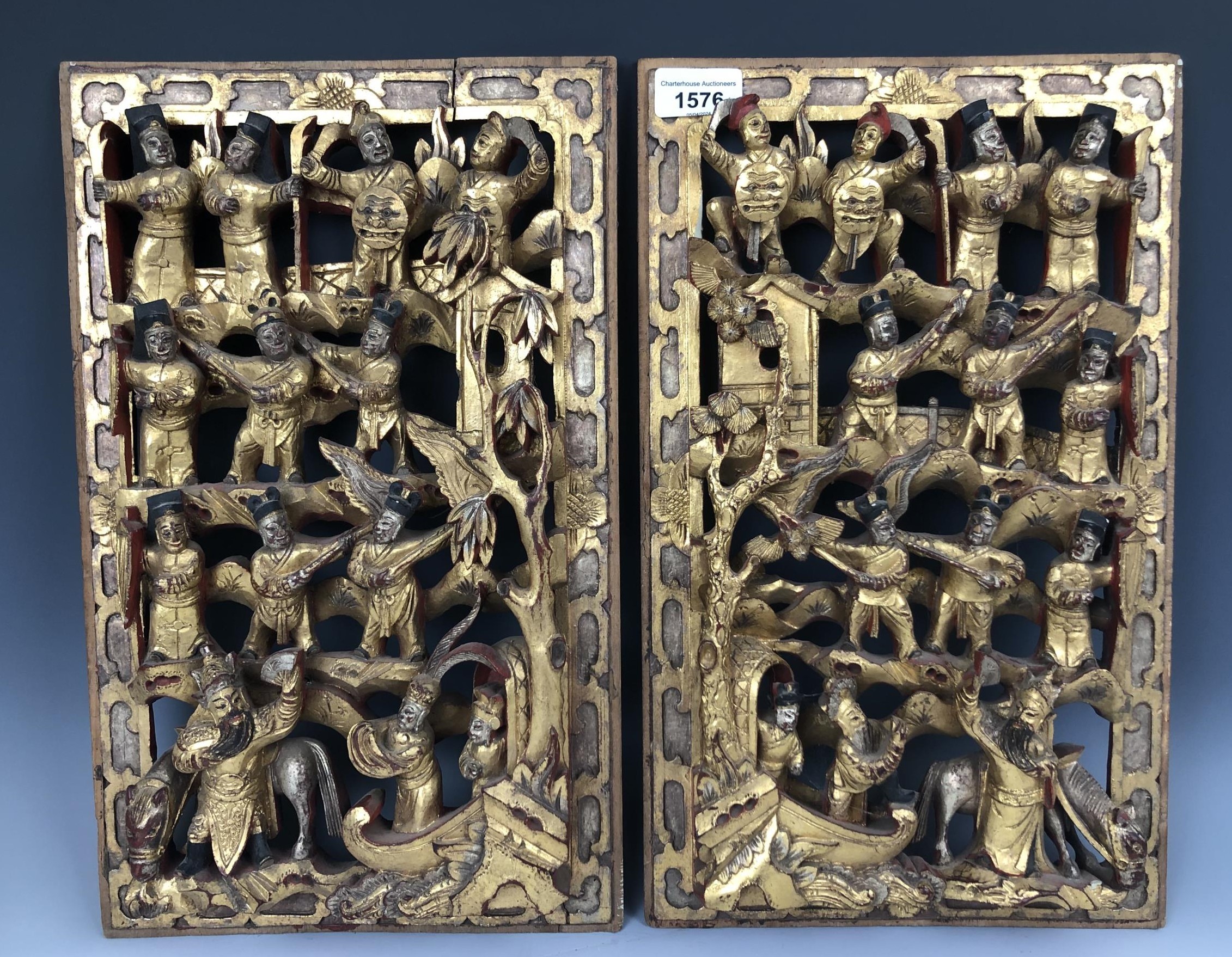 A pair of Chinese carved panels, decorated figures, highlighted in gilt, 40 x 25 cm, and a pair of - Image 2 of 6