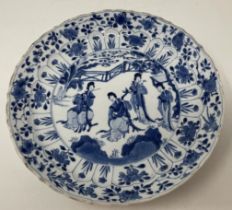 A Chinese porcelain dish, of lobed circular form, decorated lady musicians, other figures and