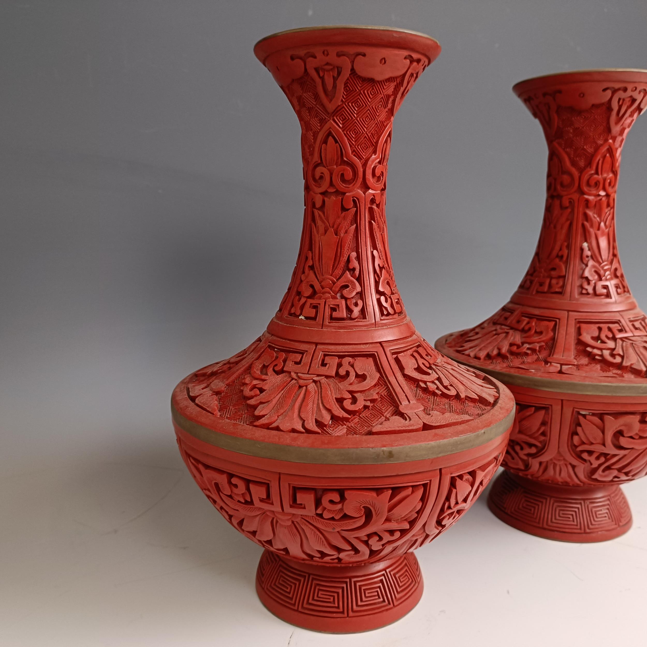 A pair of Chinese cinnabar lacquer vases, 27 cm high Provenance: Purchased from the Sotheby's - Image 3 of 9