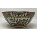 A Cantonese famille rose bowl, decorated figures and foliage, 27.5 cm diameter Rim rubbed, star