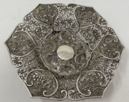 A Chinese silver coloured metal hexagonal bowl, embossed and pierced dragons, animals and foliage,
