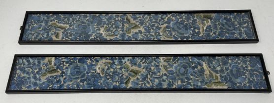 A pair of Chinese embroidered sleeves, decorated flowers and butterflies, each 54 x 8 cm, framed and