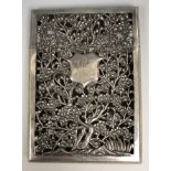 A Chinese silver coloured metal visiting card case, initialled, pierced prunus decoration, 11.5 cm