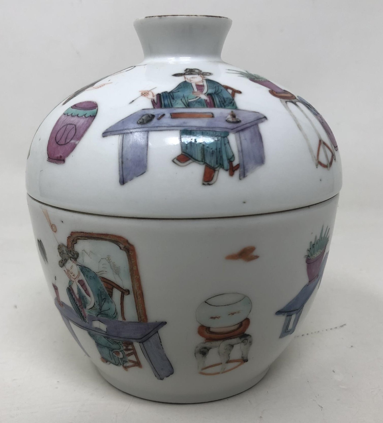 A Chinese famille rose cup and cover, decorated figures, character mark to base, 13 cm high base