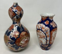 A Japanese Imari double gourd vase, 25 cm high, and a Japanese Imari vase, 20 cm (2)