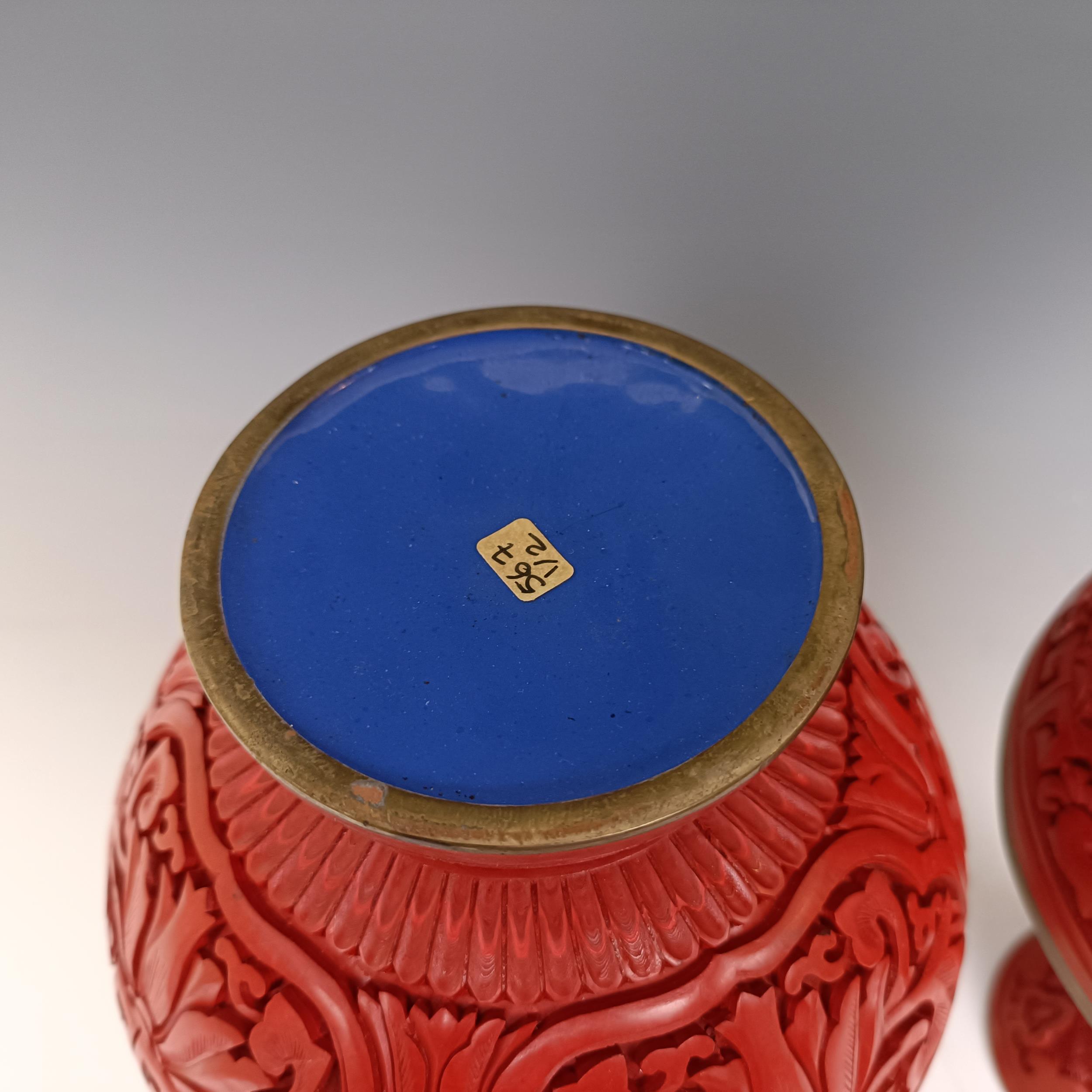 A pair of Chinese cinnabar lacquer vases, 27 cm high Provenance: Purchased from the Sotheby's - Image 5 of 9