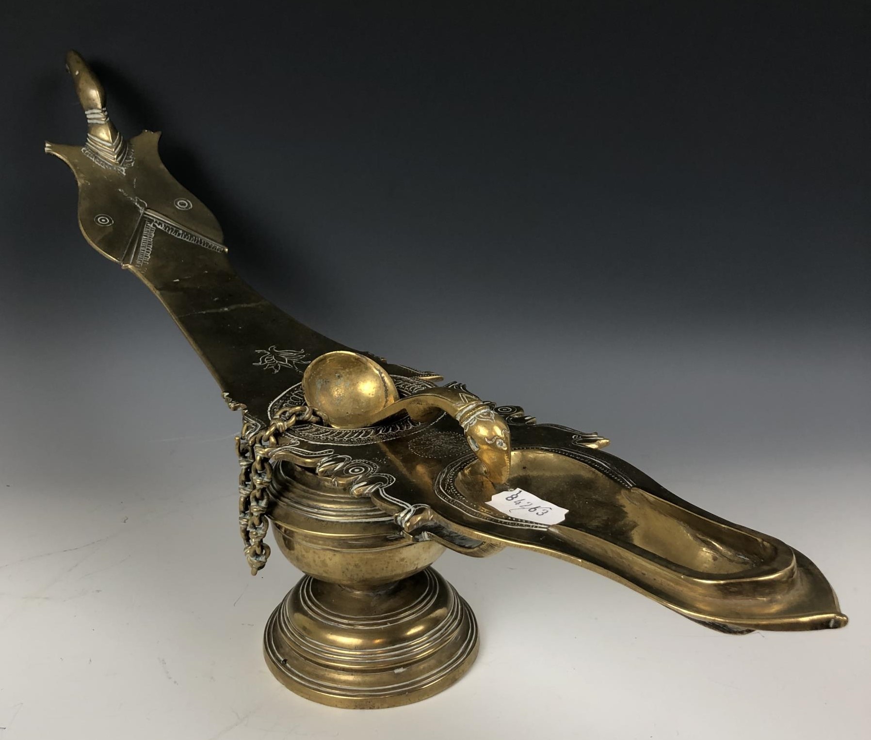 An Eastern brass oil lamp, 60 cm wide, and a brass and copper vase, decorated dragons, 49 cm high - Image 7 of 13
