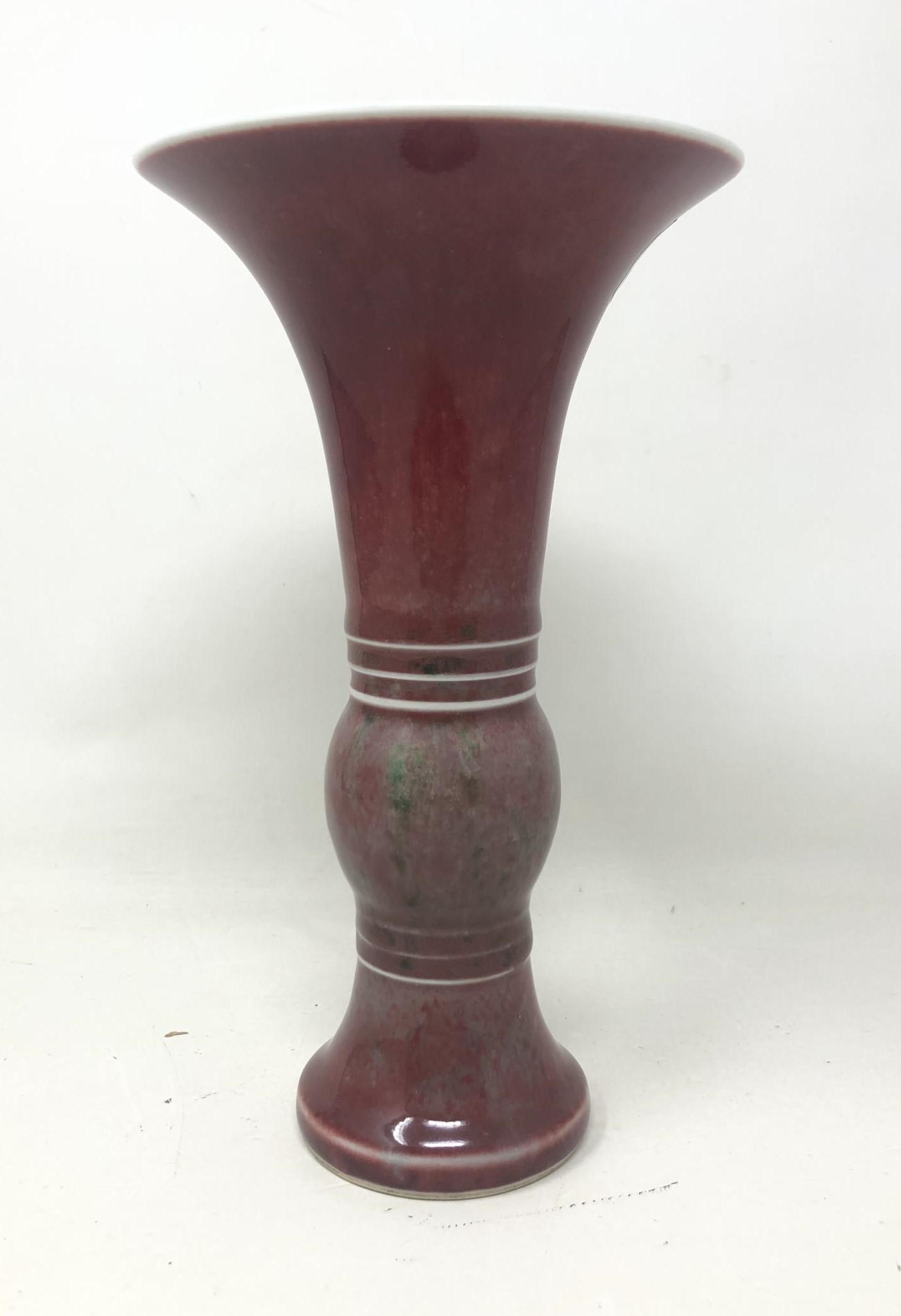 A Chinese sang-de-boeuf trumpet vase, six character mark to base, 20 cm high No visible chips cracks