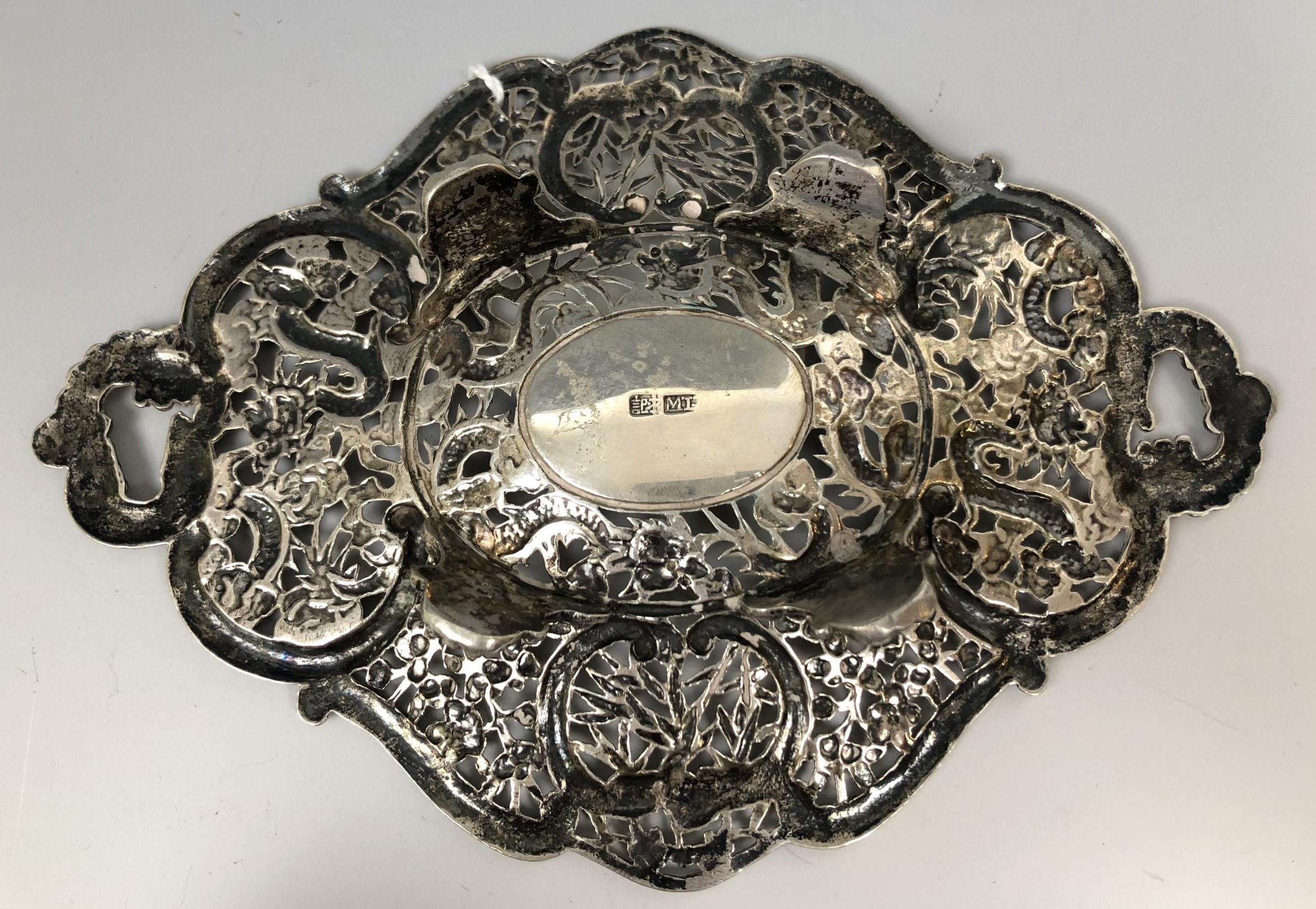 A Chinese silver coloured metal dish, embossed and pierced prunus and dragons, 15.5 cm wide 3.1 ozt - Image 3 of 4