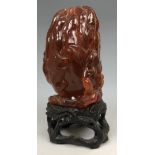 A Chinese amber vase, in the form of Buddhas hand form (finger citron), probably Qing Dynasty,