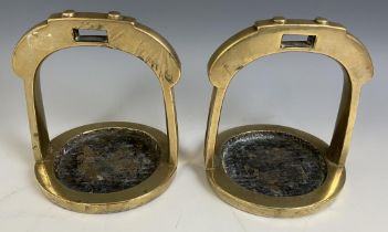 A pair of Chinese brass horse stirrups, 15.5 cm high (2)