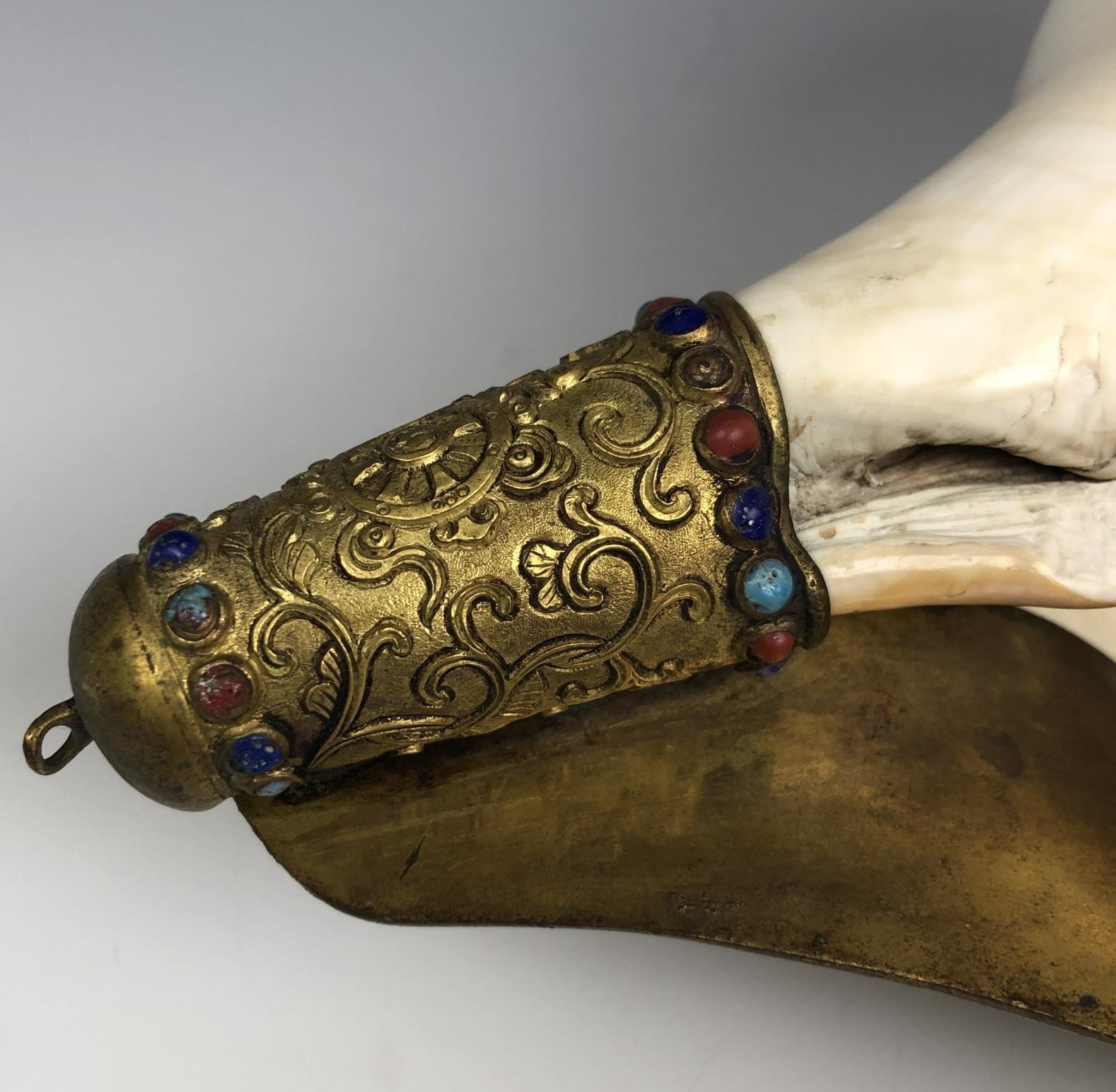 A Chinese conch shell trumpet, with a gilt bronze flange decorated in relief, with the eight - Image 6 of 6