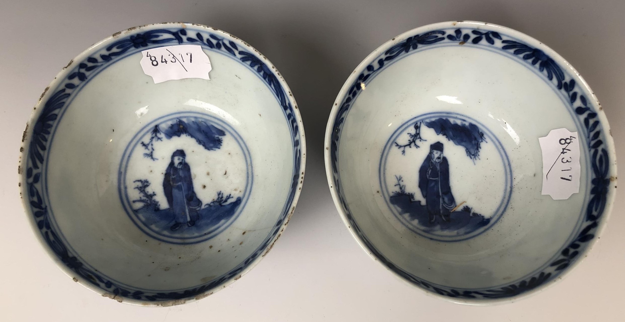 A pair of Chinese porcelain bowls, decorated panels of figures and landscapes in underglaze blue, - Image 2 of 7