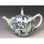 A Chinese teapot and cover, decorated birds, flowers and foliage in underglaze blue, 11.5 cm high