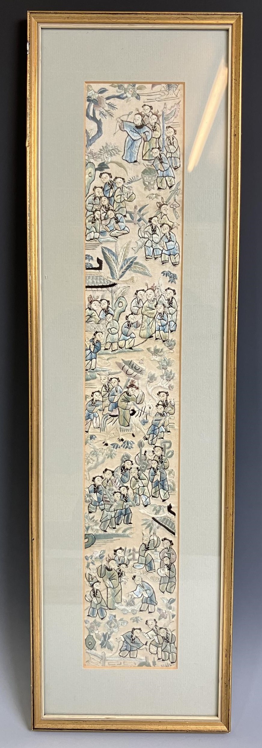 A pair of Chinese silk embroidered panels, decorated figures, 55 x 7 cm, and another similar, 48 x 9 - Image 2 of 2