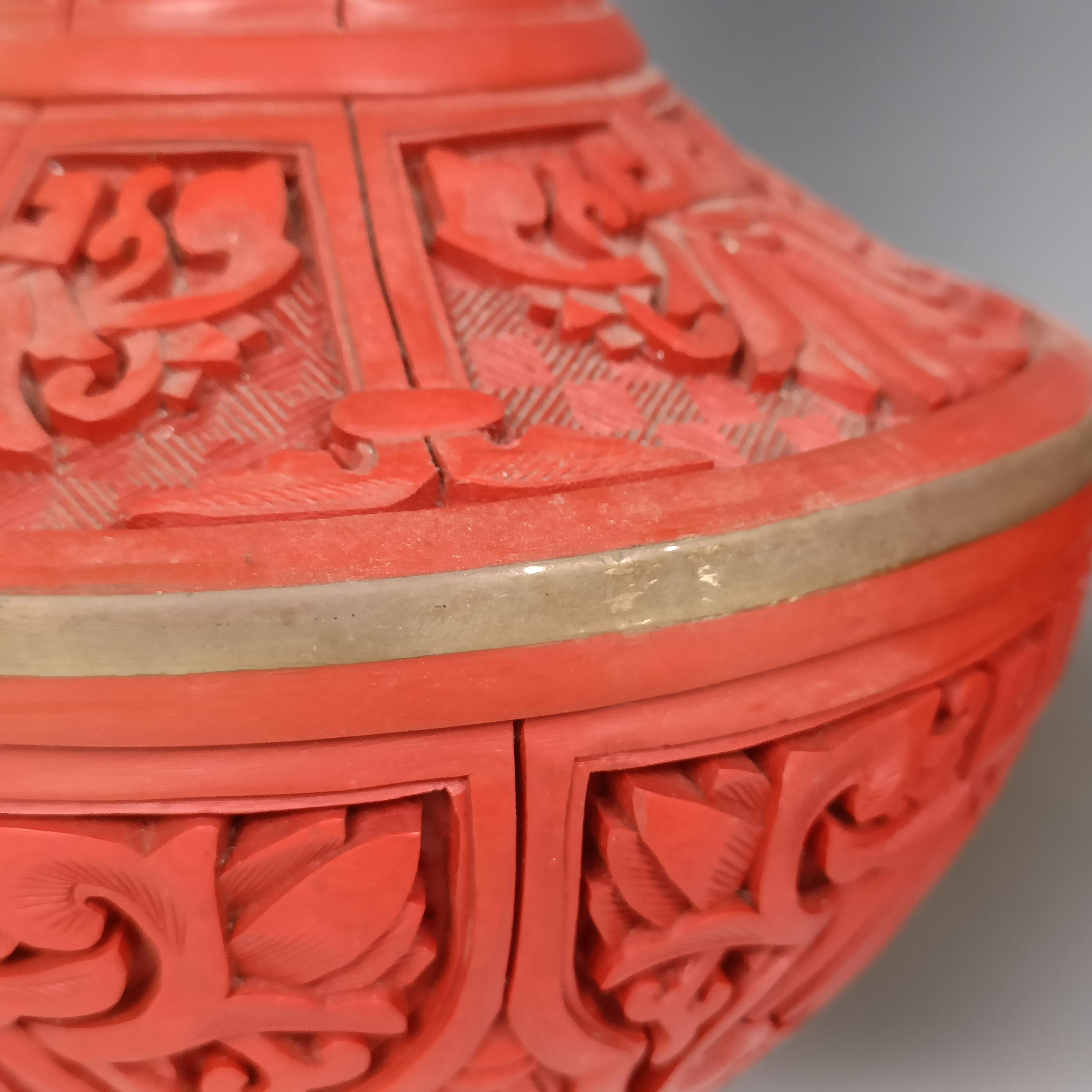 A pair of Chinese cinnabar lacquer vases, 27 cm high Provenance: Purchased from the Sotheby's - Image 7 of 9