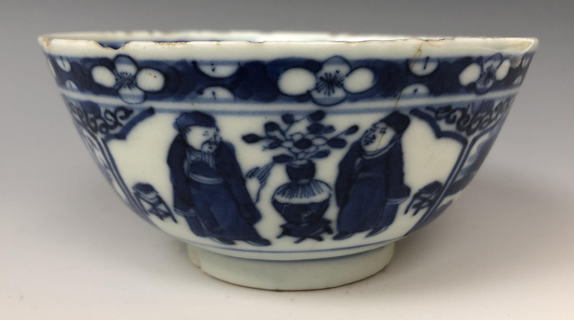 A pair of Chinese porcelain bowls, decorated panels of figures and landscapes in underglaze blue, - Image 4 of 7