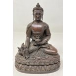 A Chinese bronze Buddha, 15 cm high