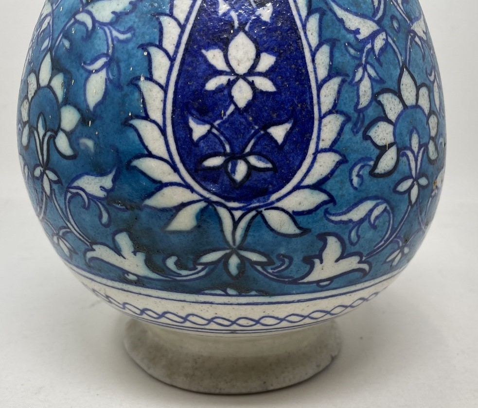 An Isnik blue ground vase and cover, 37 cm high with large losses and restored - Image 2 of 7