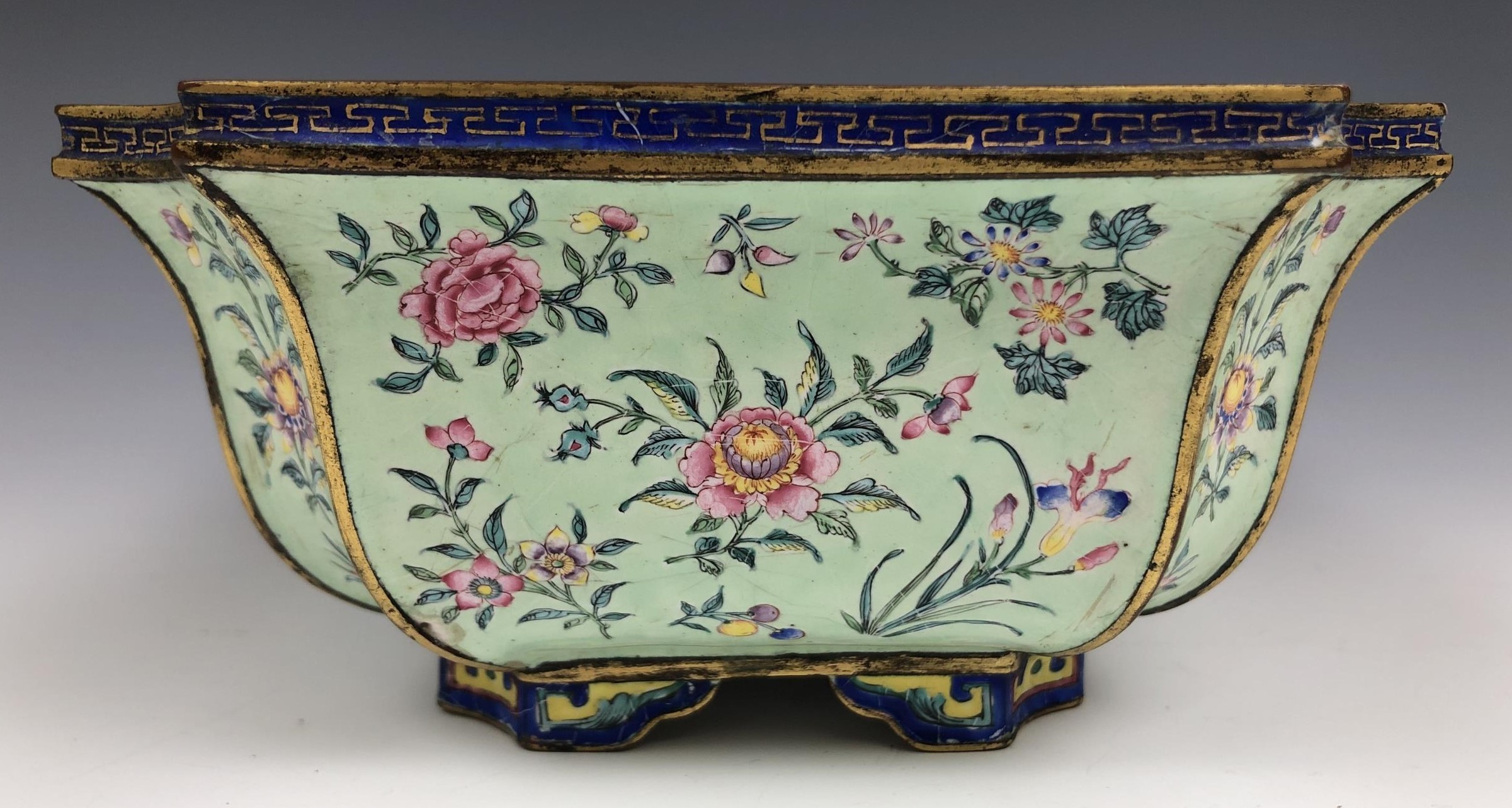 A pair of Chinese Canton enamel jardinieres, decorated flowers on a pale green ground, 19.5 cm - Image 3 of 6