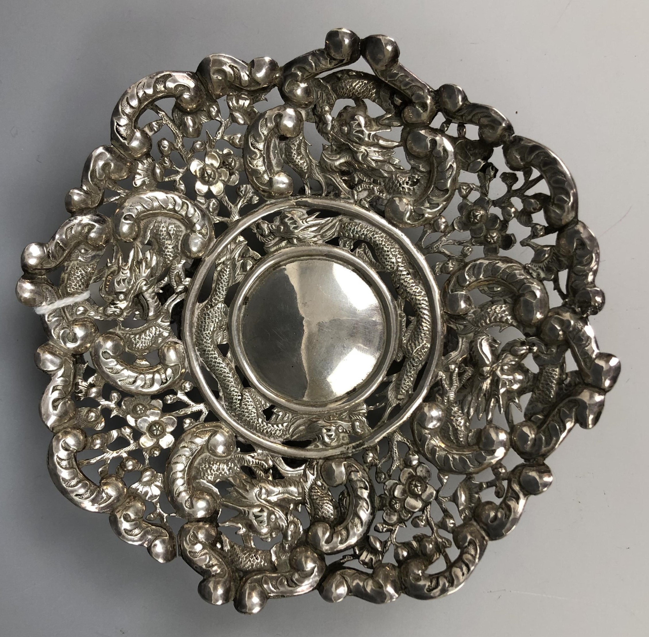 A Chinese silver coloured metal dish, embossed dragons and foliage, 12 cm diameter 2.3 ozt - Image 2 of 5