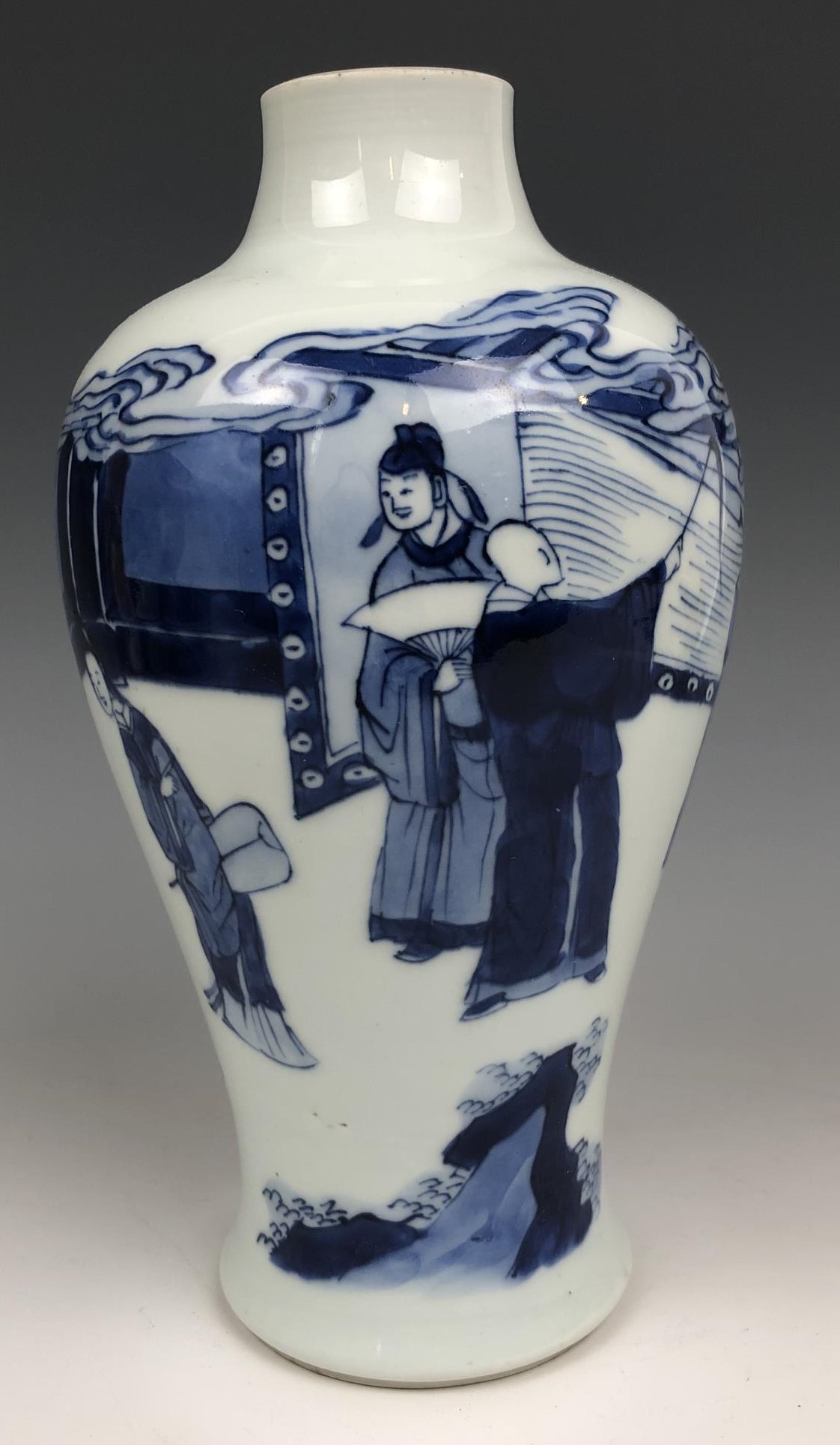 A Chinese blue and white vase, four character mark to base, 20 cm high, a blanc de chine figure, and