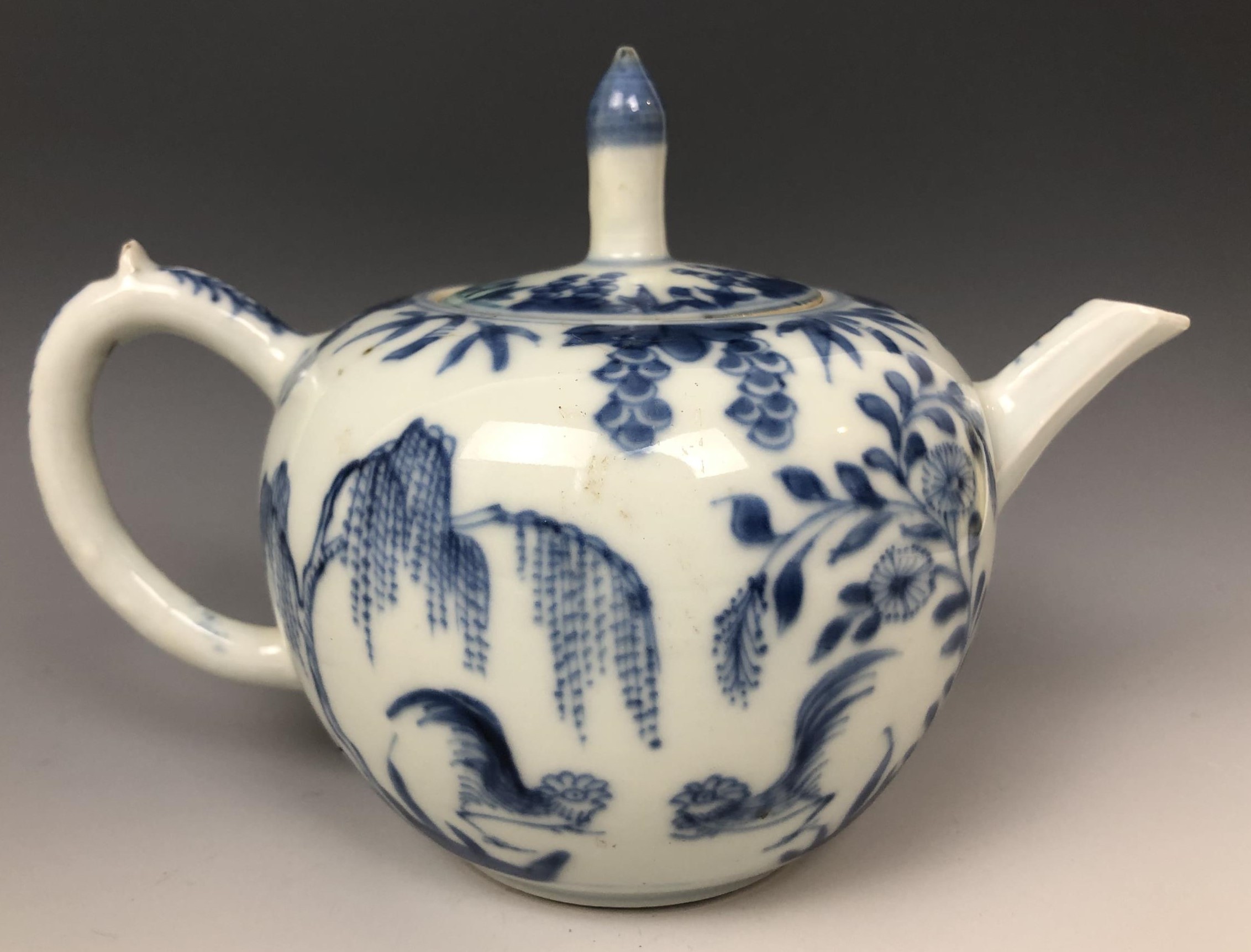 A Chinese teapot and cover, decorated birds, flowers and foliage in underglaze blue, 11.5 cm high - Image 2 of 5