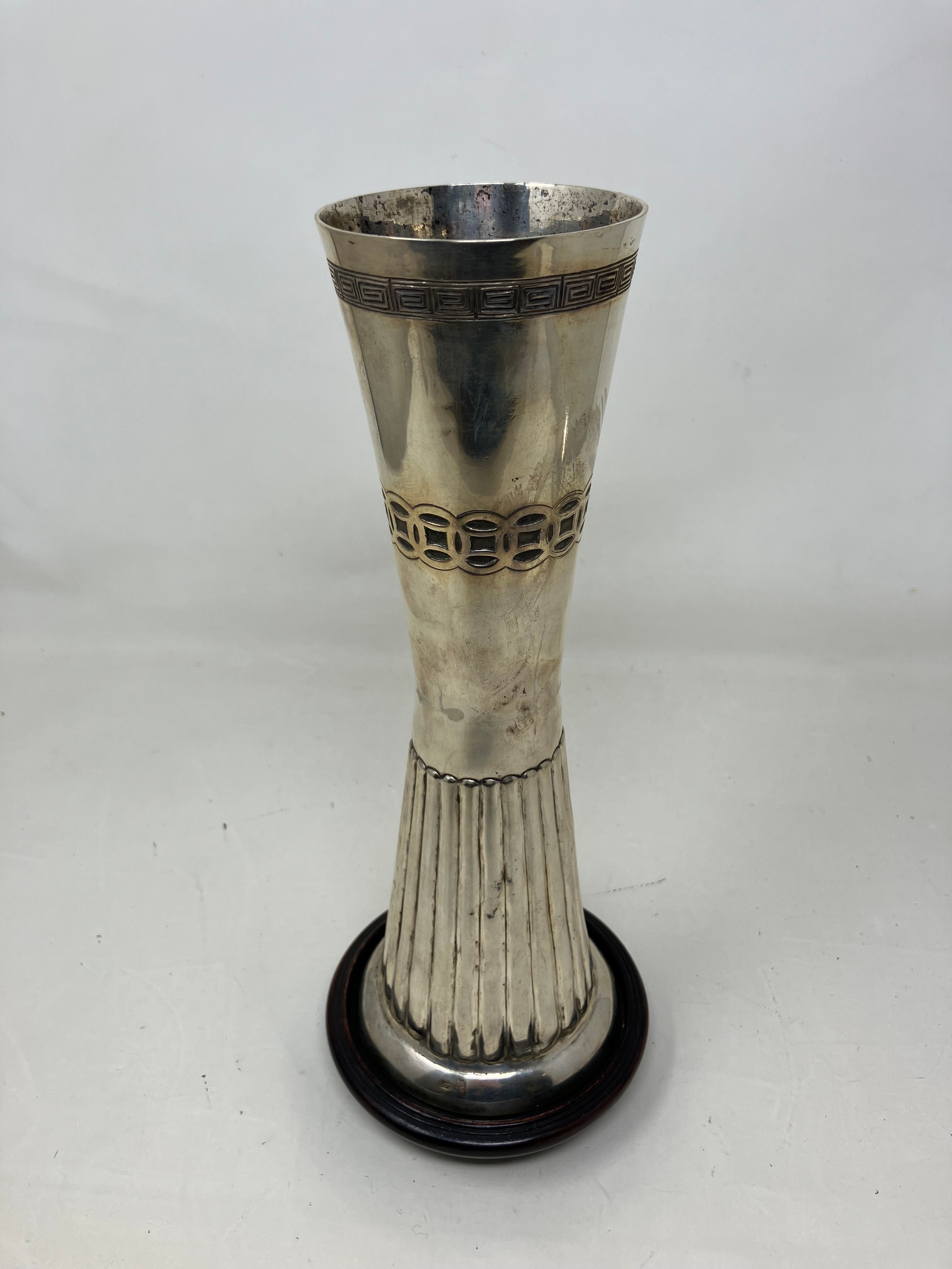 A Chinese silver coloured metal vase, base filled, 25 cm high Looks to is joined in the middle (