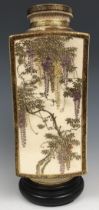 A Japanese Satsuma vase, of square form, decorated wisteria, iris, butterflies and figures on a