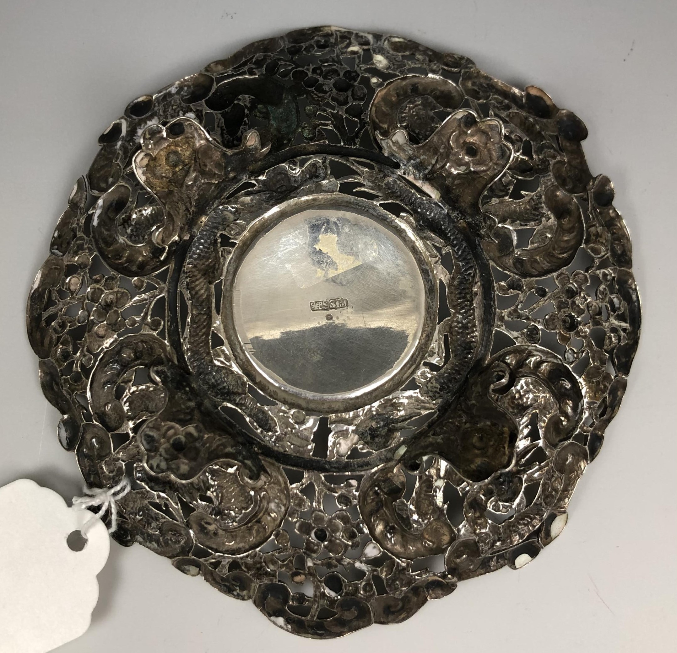 A Chinese silver coloured metal dish, embossed dragons and foliage, 12 cm diameter 2.3 ozt - Image 3 of 5