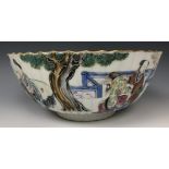 A Chinese bowl, of lobed circular form, decorated figures in famille rose enamel colours, painted