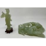 A Chinese carved greenstone figure of a dragon, 20 cm high, and another of a lady, 16 cm high (2)