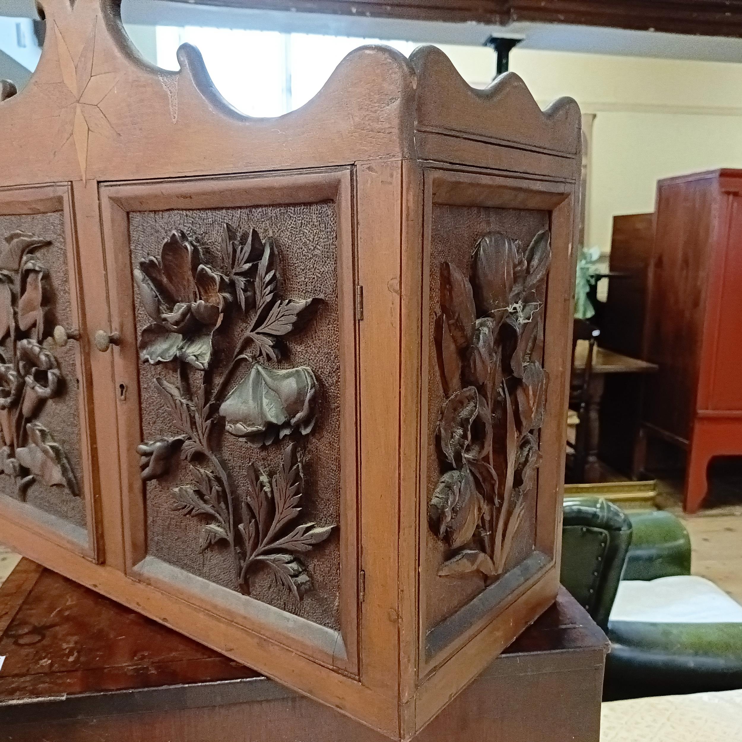 A walnut cupboard, decorated with carved flowers, 54 x 64 cm - Image 2 of 10