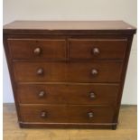 A mahogany chest, of two short and three long drawers