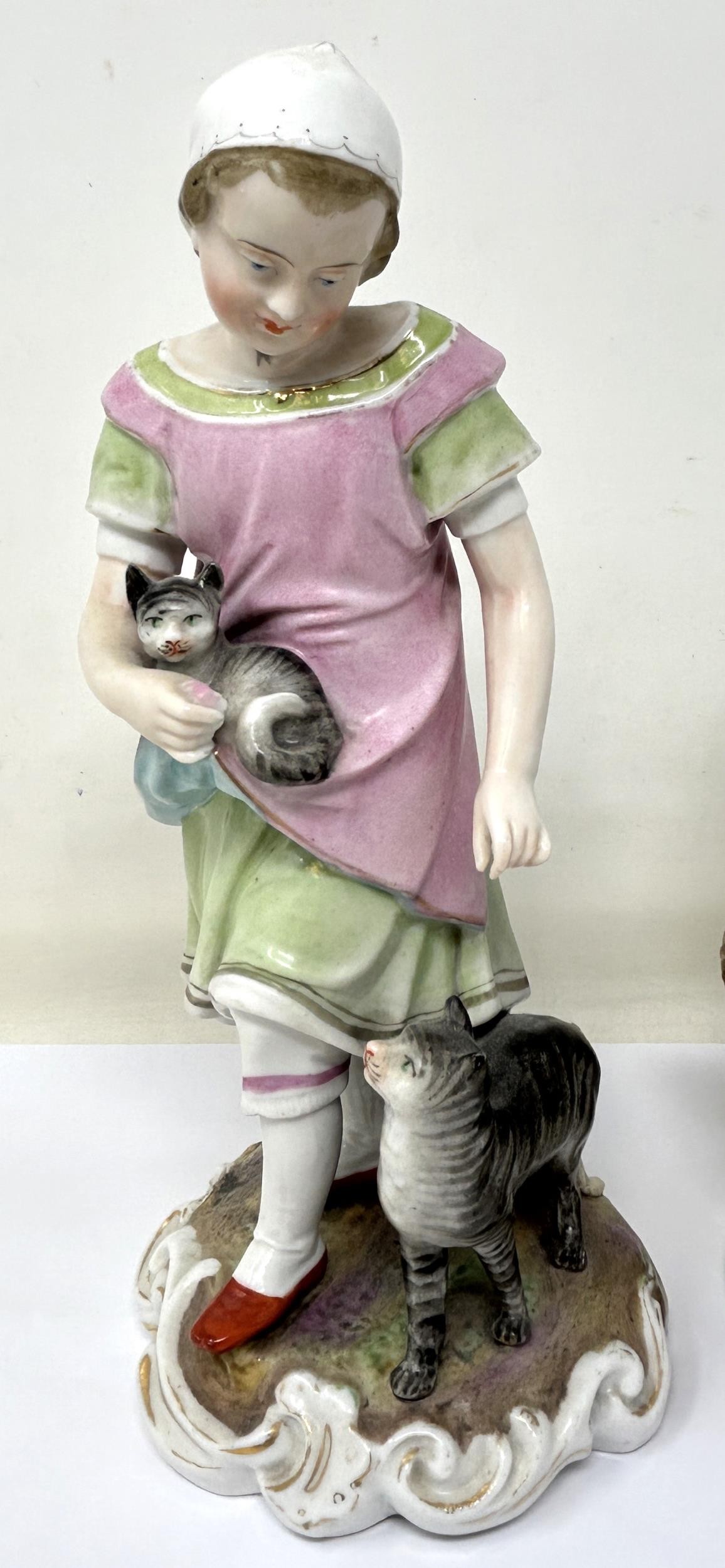 A pair of Dresden figures, of a young boy with a dog and puppy, and a young girl with a cat and - Image 2 of 5