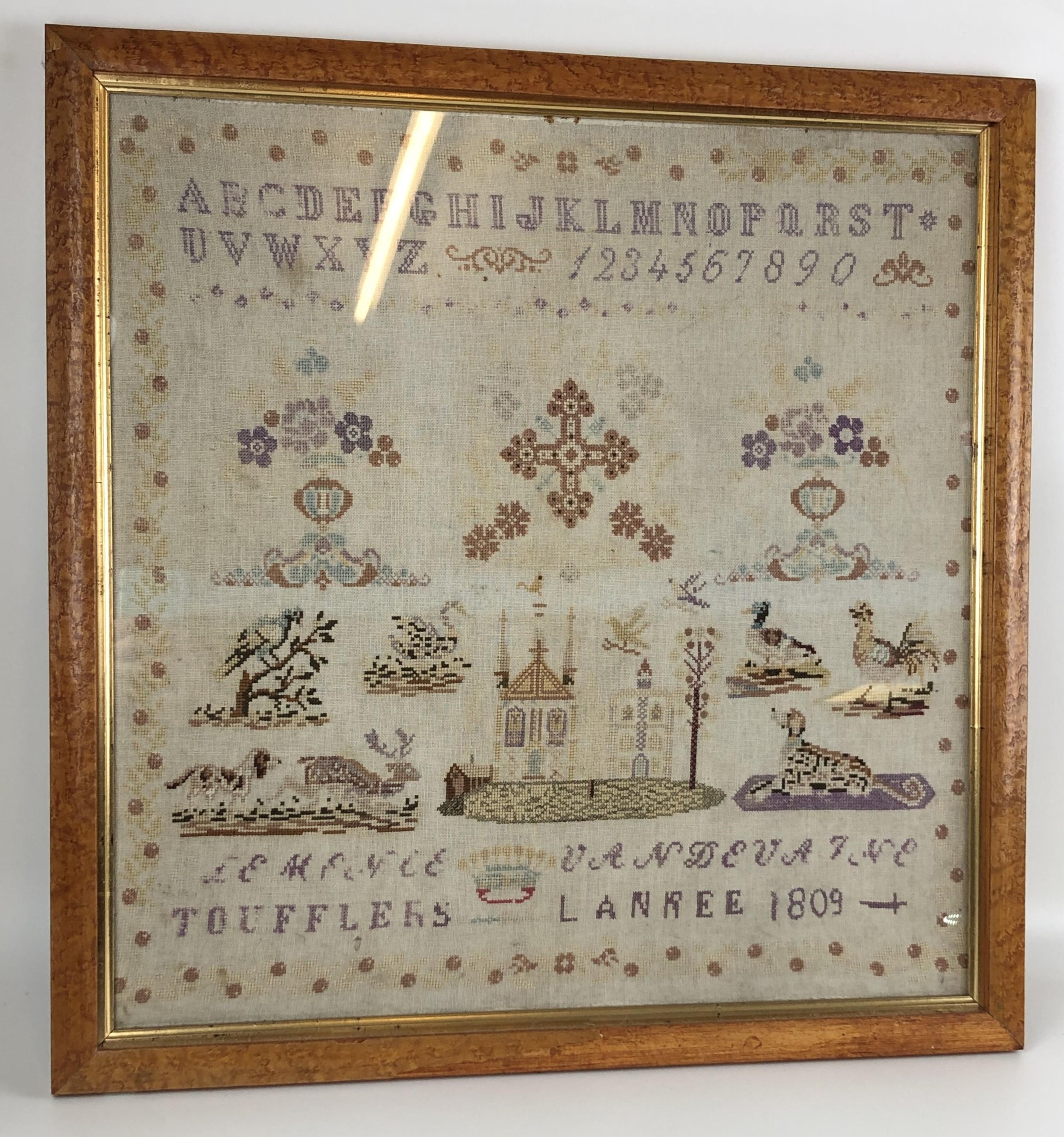 A 19th century sampler, signed Toufflers Lanree, dated 1809, 51 x 50 cm